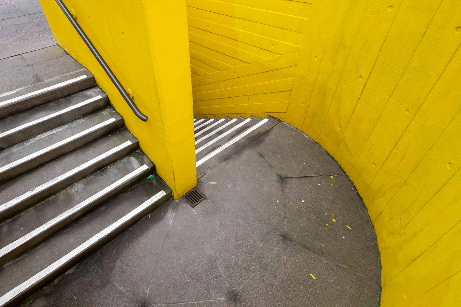 screaming at yellow as loudly as it screams at me. Looking down a canary yellow staircase at the BFI South Bank