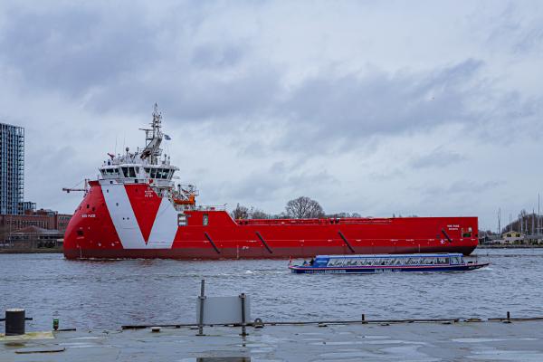 Rig resupply vessel making its way down the Ij towards the North Sea. A welcome splash of colour on a February morning.